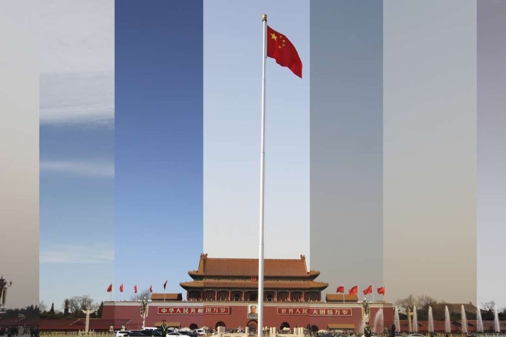 Skies over the Great Hall of the People clear then cloud over again with smog before and during the key political gatherings in Beijing. Photo: Simon Song