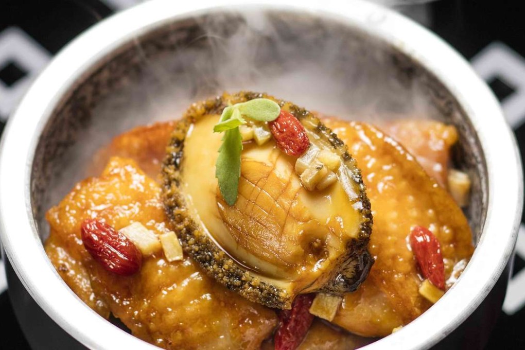 Abalone and chicken with sand ginger casserole at Man Wah Restaurant