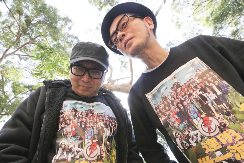 Tats Lau (left) and Anthony Wong, wearing T-shirts of their controversial poster. Photo: Felix Wong