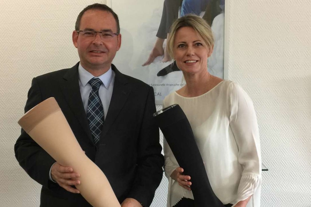 Christoph Künzler, chief financial officer; and Bettina Moosmann, head of corporate communications