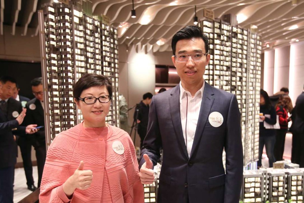 Virginia Kao (left), head of sales and maketing, and Kong Jian, assistant general manager of Poly Property (Hong Kong) at the launch ceremony of Vibe Centro on Wednesday. Photo: Edward Wong