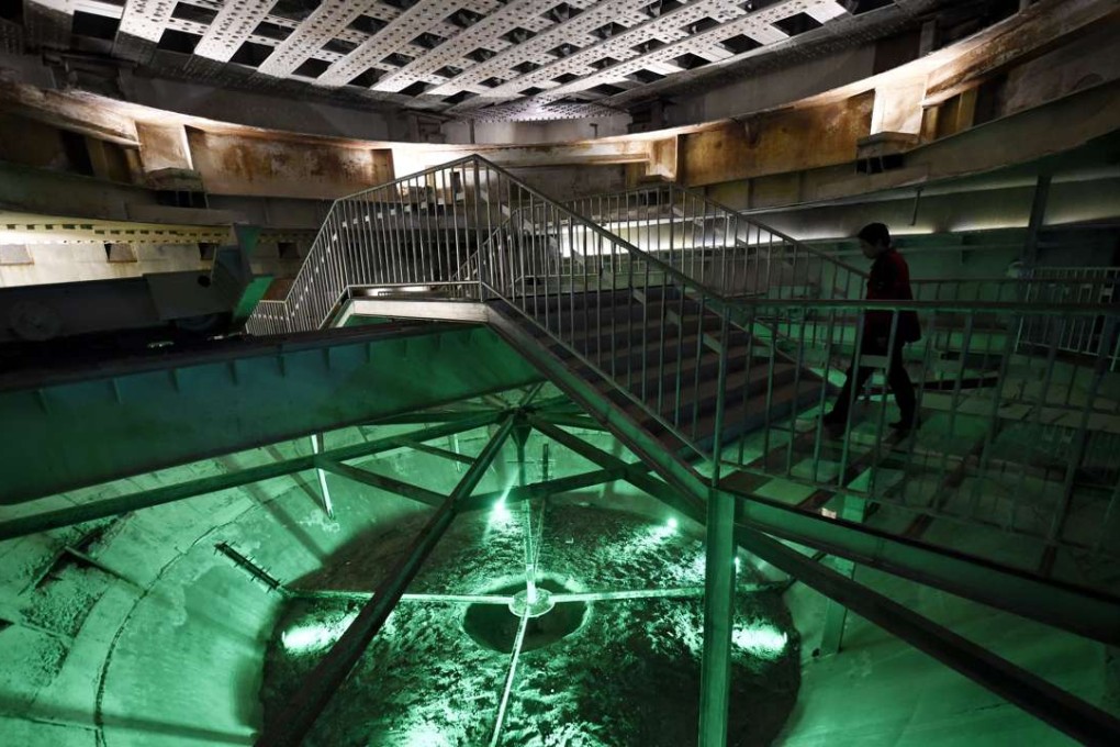 A tourist visiting the "816 Nuclear Military Engineering" installation in the mountains of Fuling district in southwest China's Chongqing municipality. Photo: AFP