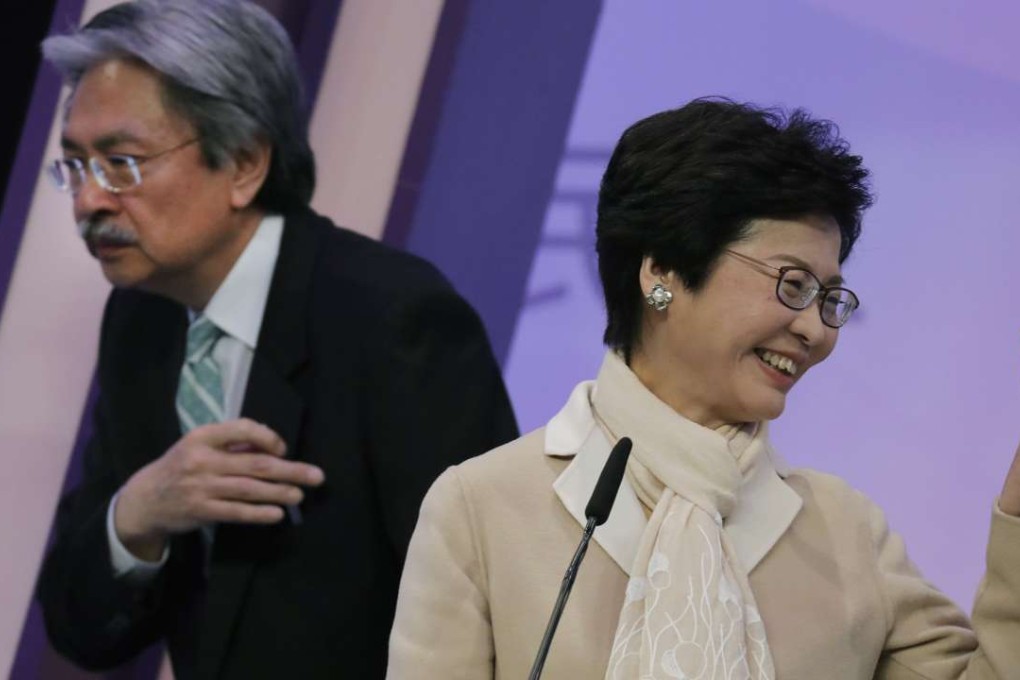 Rival candidates John Tsang and Carrie Lam at an election debate on March 14, with less than two weeks to go before a 1,194-member committee makes its choice among three hopefuls, the third being retired judge Woo Kwok-hing. Photo: AP