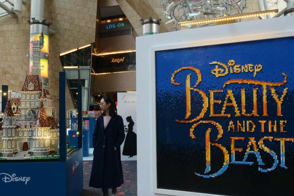 People visit a lego-inspired preview of Beauty and the Beast in Hong Kong. Photo: Xinhua