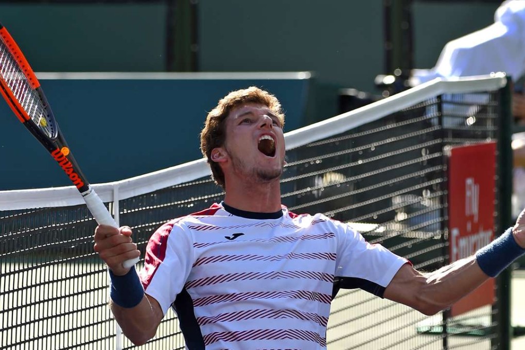 Pablo Carreno Busta celebrates match point as he defeats Pablo Cuevas in the quarter-final of the Indian Wells Masters. Photo: USA Today