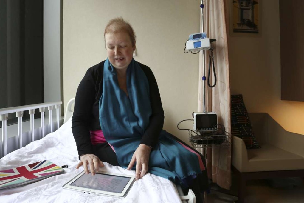 Hilary Faulkner, who is writing a book about her experience of cancer and treatment, at the Hong Kong Integrated Oncology Centre. Photo: Jonathan Wong
