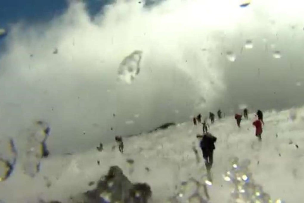 In a scene captured by a BBC camerawoman, tourists and scientists flee for their lives from an eruption on Mount Etna. Photo: BBC