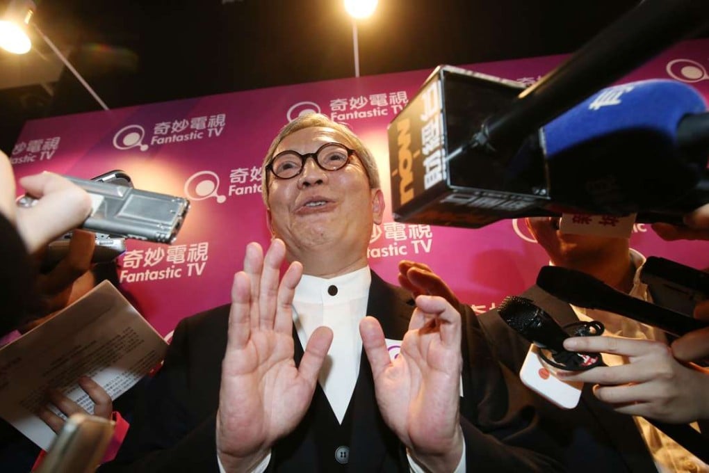 Samuel Tsang Chin-cheung, executive director of i-Cable Entertainment, talks to the media after the launching ceremony of its free TV service Fantastic TV on March 15. Photo: Edward Wong