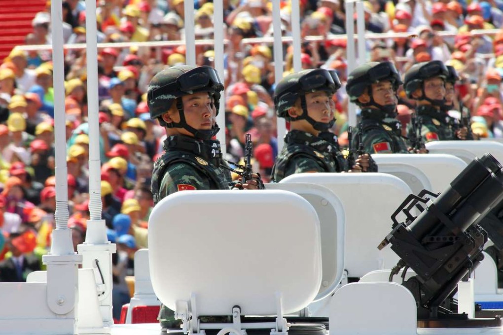PLA troops pictured taking part in a military parade in the centre of Beijing two years ago. Photo: Simon Song