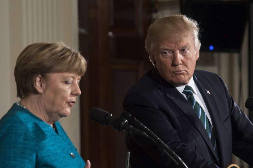 US President Donald Trump and German Chancellor Angela Merkel. Photo: EPA
