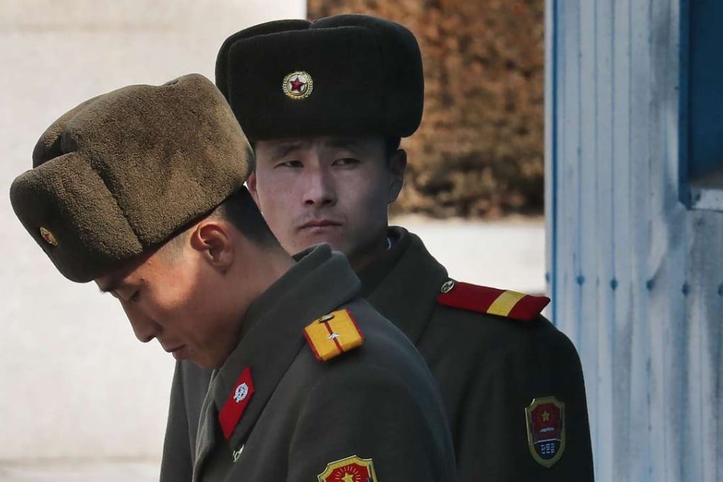 A flile picture of North Korean soldiers in the demilitarized zone on the border with South Korea. Photo: Yonhap