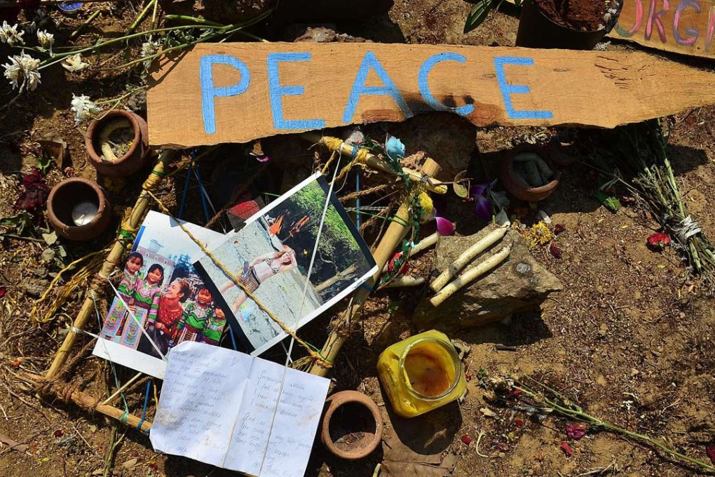Artifacts placed by mourners at the location where the body of Irish tourist Danielle McLaughlin was found in Canacona. Photo: AFP