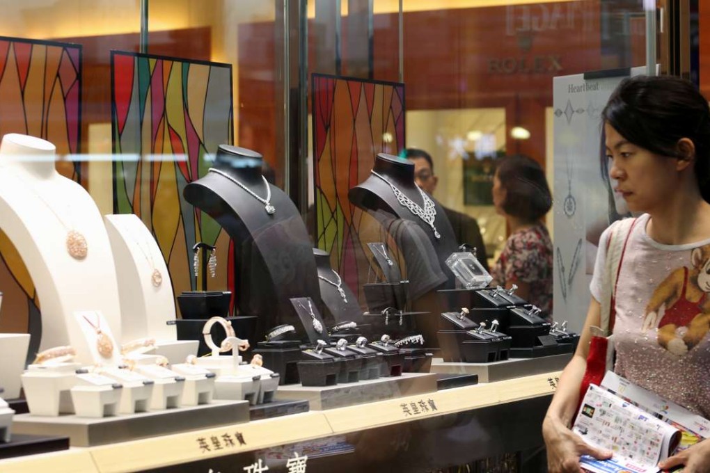 Mainland Chinese tourists are returning to Hong Kong in greater numbers, giving jewellers like Emperor Watch & Jewellery a boost. This time, they are buying to indulge themselves, rather than in gift-giving. Photo: SCMP
