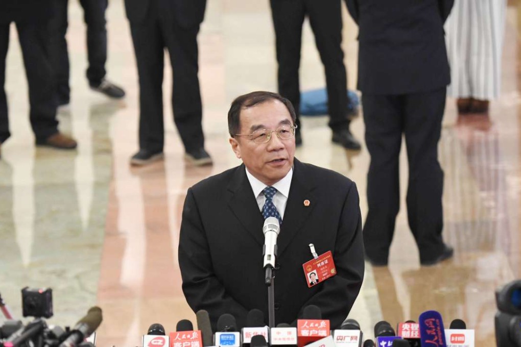 Minister of Supervision Yang Xiaodu makes a statement during the National People's Congress at the Great Hall of the People in Beijing earlier this month. Yang said two types of entrepreneurs had been keen to cultivate links with government officials. Photo: Xinhua