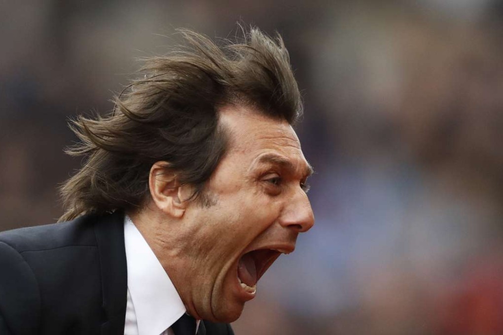 Antonio Conte celebrates after Gary Cahill scores their second goal. Photo: AFP