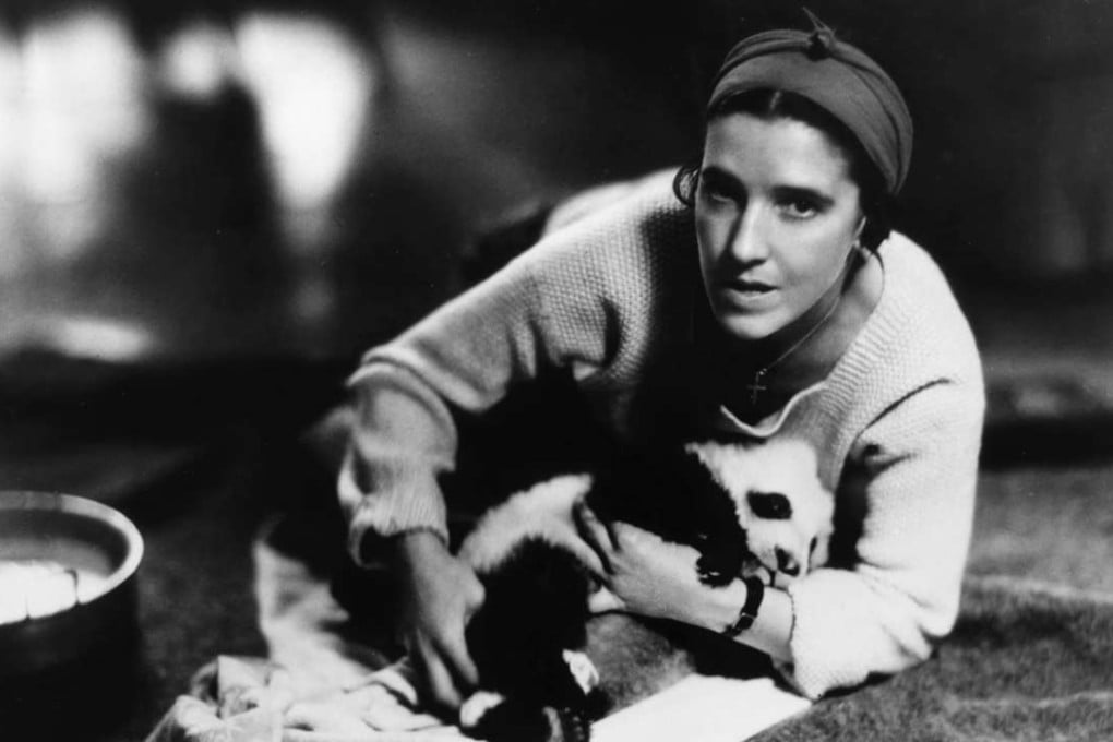 Su Lin, the first panda to arrive in the United States, with Ruth Harkess, the American fashion designer and socialite who carried the panda cub from China, in 1936.