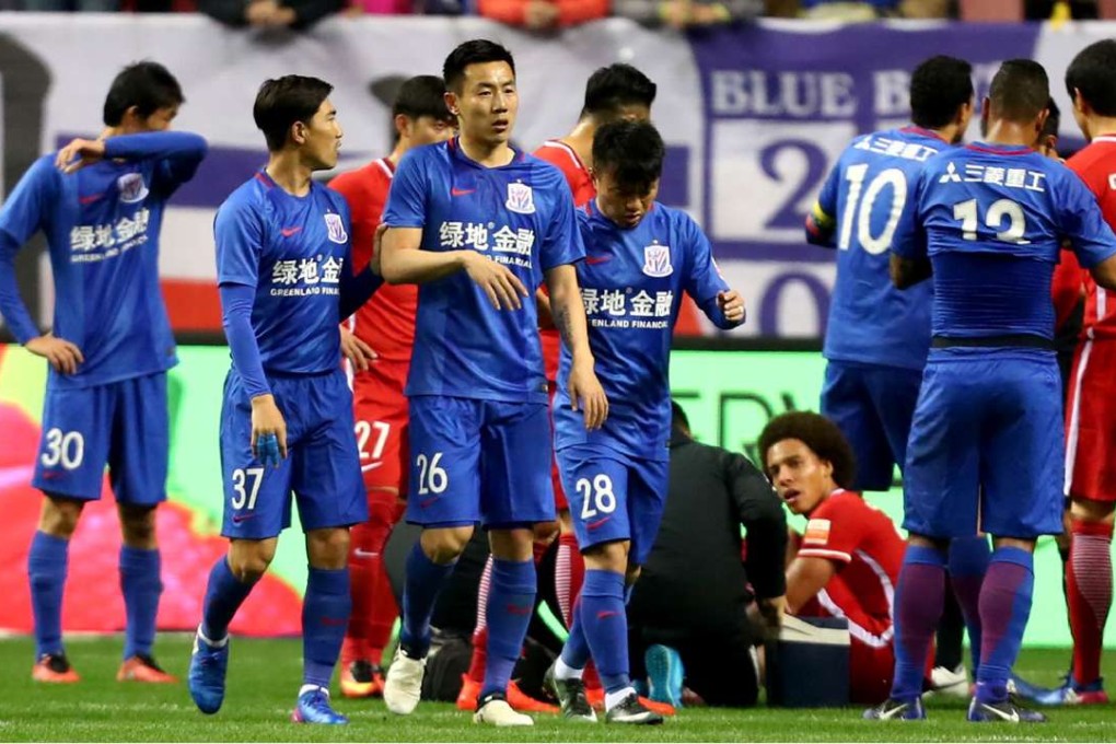 Shanghai Shenhua’s Qin Sheng (26) has been severely punished for causing a perceived loss of face for his club after his stamp on Axel Witsel. Photo: AFP