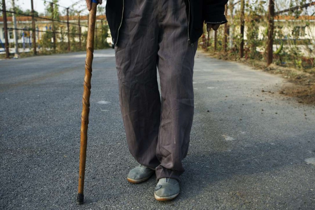 An elderly man takes a walk at the Fu Tai senior apartments in the suburbs of Beijing. Photo: Ricky Wong