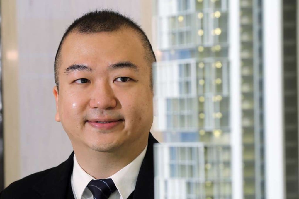 Jacky Chan Ka-yeung, Group Vice President of China Aoyuan Property Group poses for a picture at their office in Tsim Sha Tsui. 15JAN16 SCMP/Edward Wong