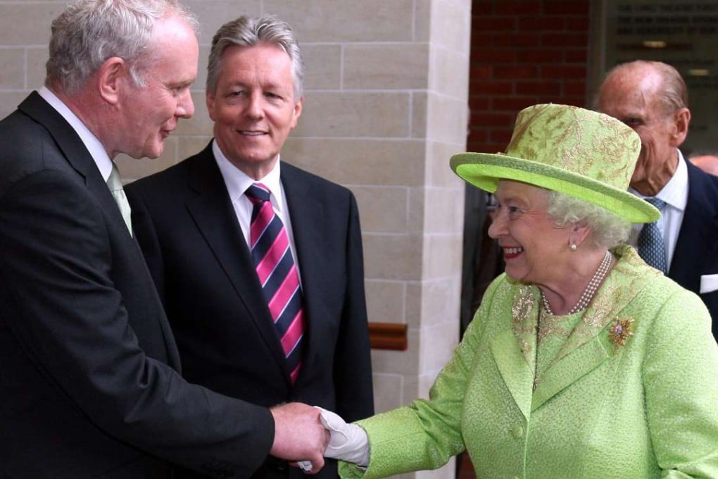 Britain's Queen Elizabeth II shakes hands with Northern Ireland Deputy First Minister Martin McGuinness in 2012. File photo: AP