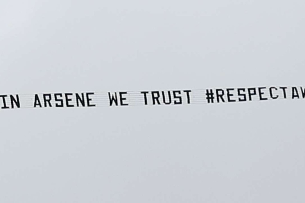 The banner in support of Arsenal manager Arsene Wenger Action Images via Reuters