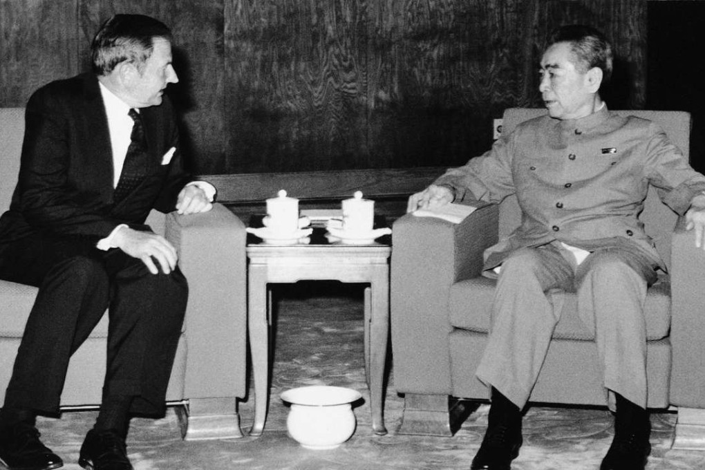 In this June 1973, file photo, David Rockefeller, left, meets Chinese Premier Zhou Enlai in Beijing. Photo: AP