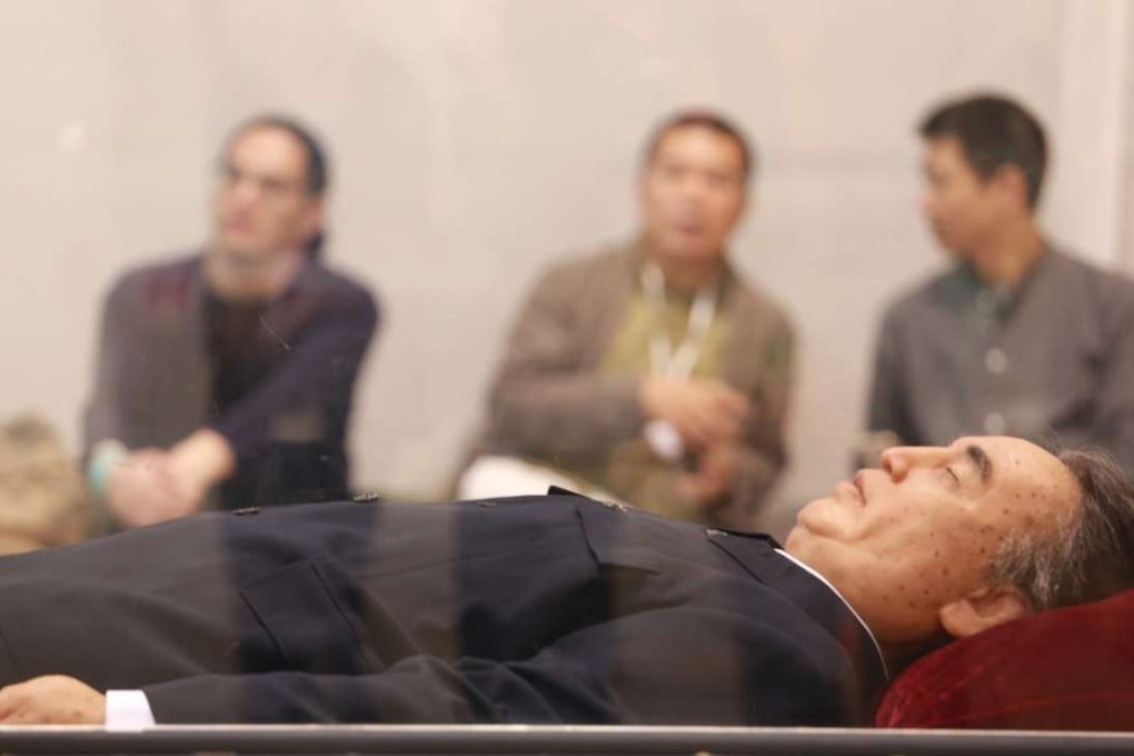 Detail from Shen Shaomin’s installation Summit (2009), showing the corpse of Kim Il-sung in a crystal coffin, at Art Basel Hong Kong. Photo: May Tse