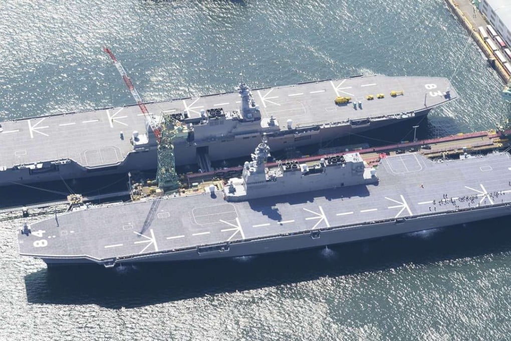 The Maritime Self-Defence Force's newly-commissioned Kaga (front), at anchor in Yokohama, near Tokyo. Another escort vessel Izumo is seen above. Photo: Kyodo