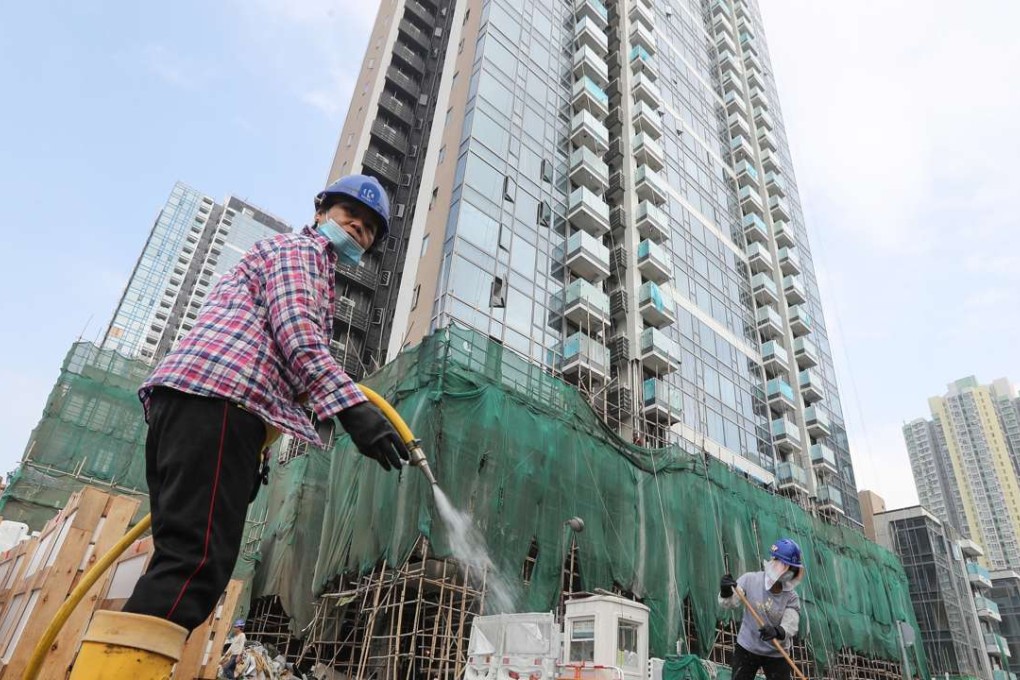 Construction workers on a job in Kai Tak. Photo: Edward Wong