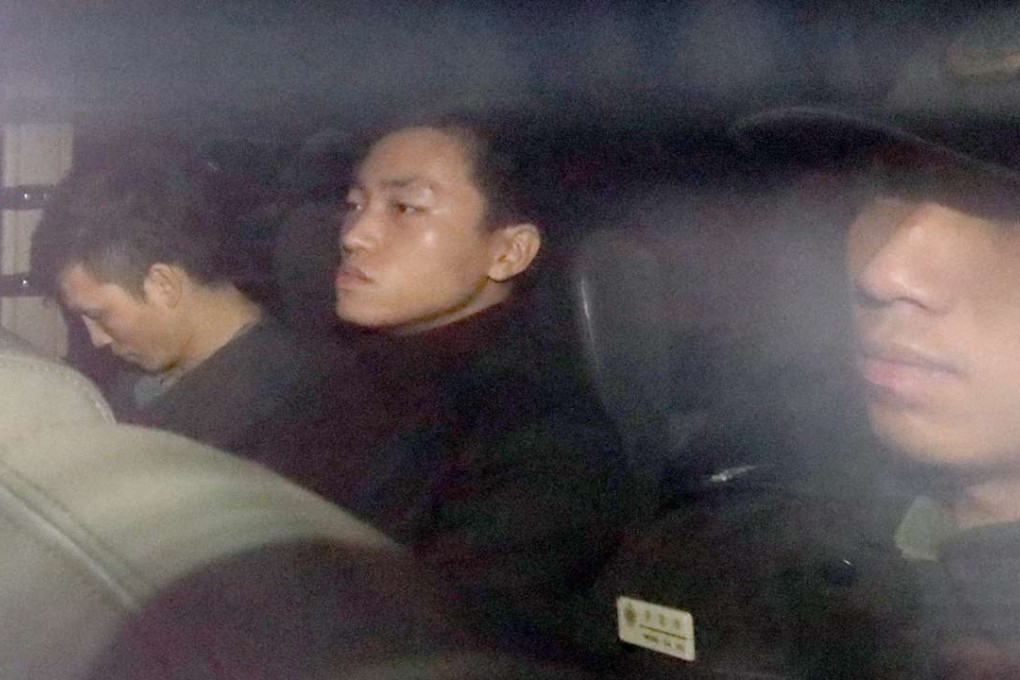 Yeung Yat-long (centre) appears at District Court in Wan Chai. Photo: Nora Tam