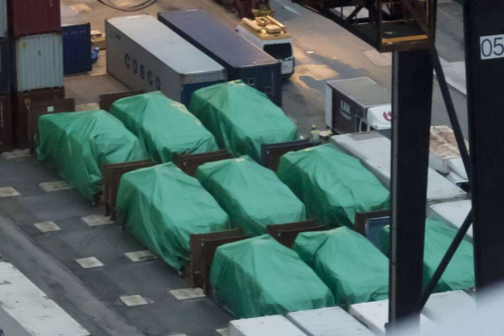 The nine Terrex carriers were kept under wraps in Hong Kong before they were finally allowed to be sent to Singapore. Photo: AP