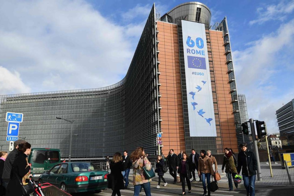 A banner celebrates 60 years of the Treaties of Rome, at the European Commission in Brussels, on March 21. European Union leaders and presidents of EU institutions will come together in Rome on March 25 to commemorate the twin treaties that laid the foundation for the EU. Photo: AFP
