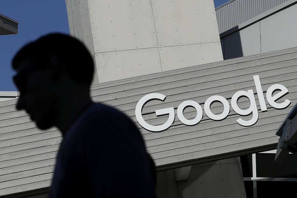 A man walks past a building on the Google campus in Mountain View, California. Google is enabling users of its digital mapping service to allow their movements to be tracked by friends and family. The location-monitoring feature will begin rolling out Wednesday, March 22, 2017. Photo: AP