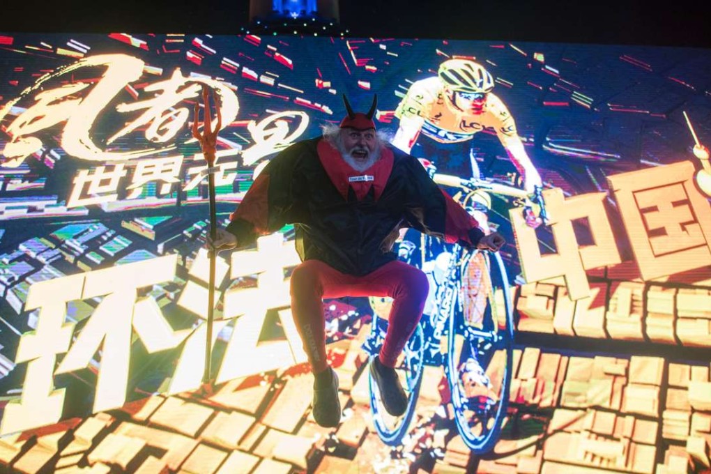 Didi Senft, a cycling enthusiast better known as 'El Diablo' (The Devil), posing during an event promoting the Tour de France. The Tour de France is on its way to China. Photo: AFP