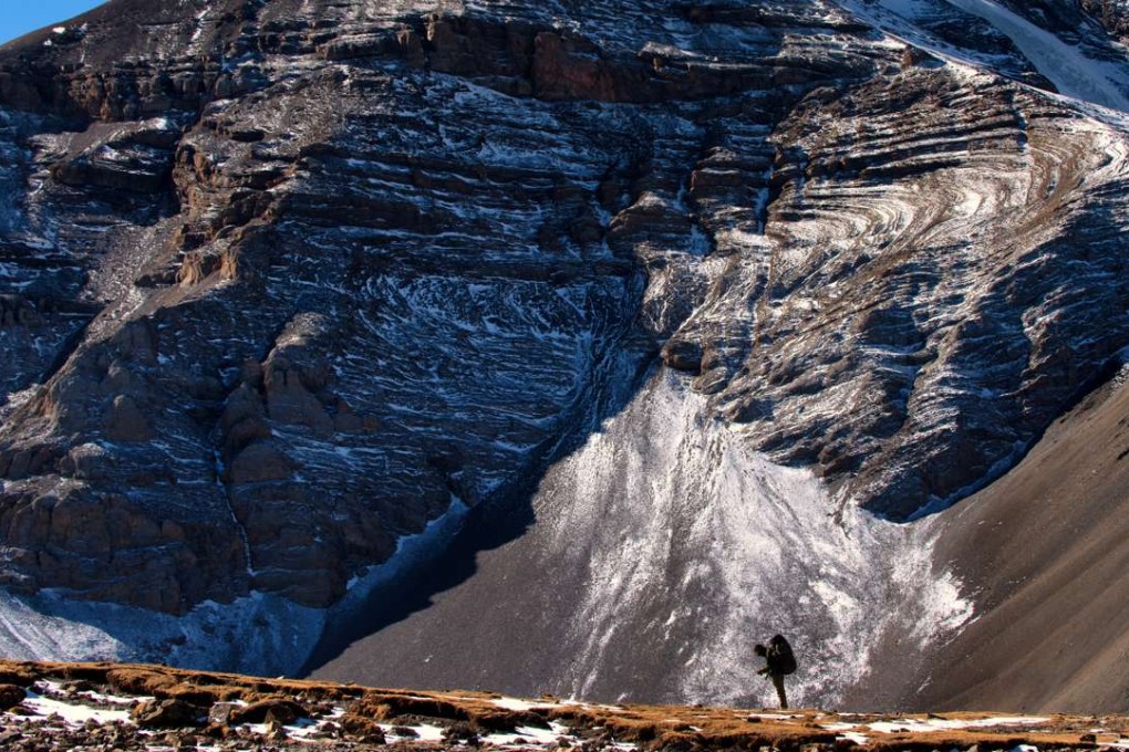 Mountaineer Jagan Timilsina searches in vain for the snow leopard in the high Himalayas, Nepal. Pictures: Andrea Oschetti