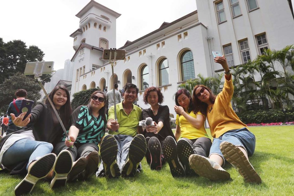 Hundreds of Hong Kong citizens show up at Government House during the open day on March 5. One of the new chief executive’s major issues will likely be Hong Kong’s housing problems. Photo: Edward Wong