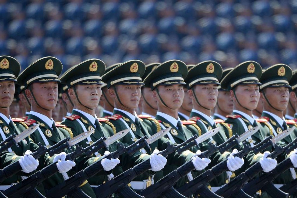 Chinese soldiers march during a military parade in Tiananmen Square in Beijing in 2015. Photo: AFP