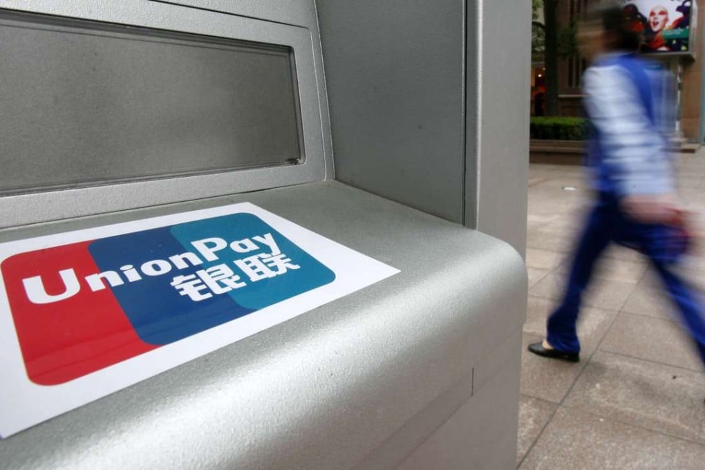 A bank ATM machine with an UnionPay sticker in Shanghai, China. Photo: Bloomberg