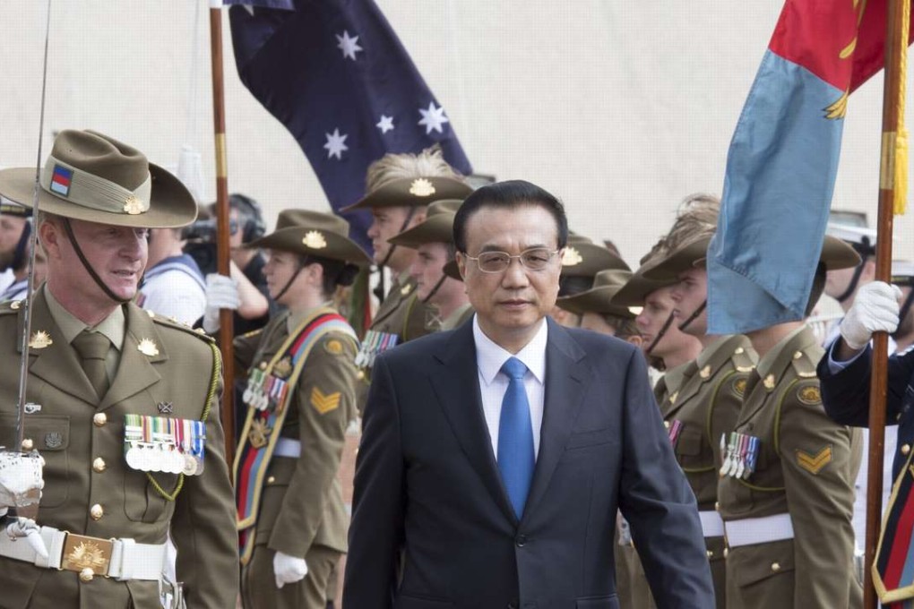 Chinese Premier Li Keqiang attends a welcome ceremony held by Australian Prime Minister Malcolm Turnbull in Canberra, Australia, March 23, 2017. Photo: Xinhua