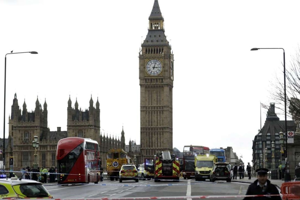 Police secure the area on the south side of Westminster Bridge in London after the attack. Photo: AP