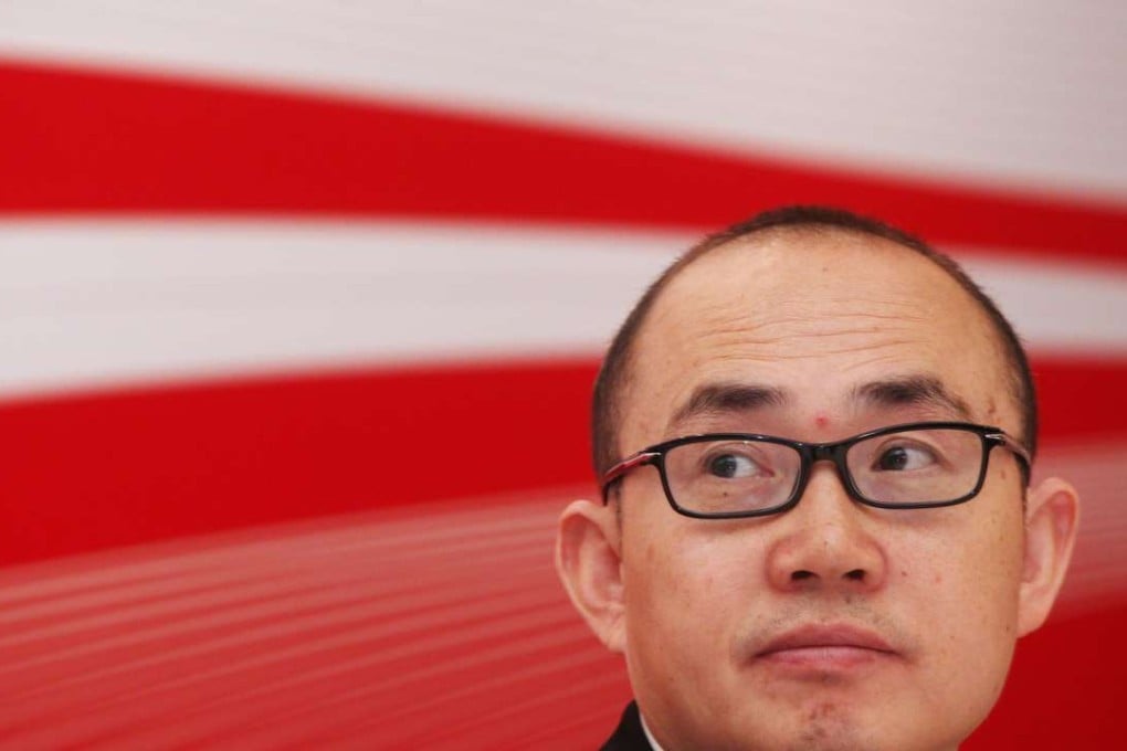 Pan Shiyi, Executive Director and Chairman, Soho China, attends the Company's 2011 annual results press conference at Island Shangri-la Hotel, Admiralty. 14MAR12