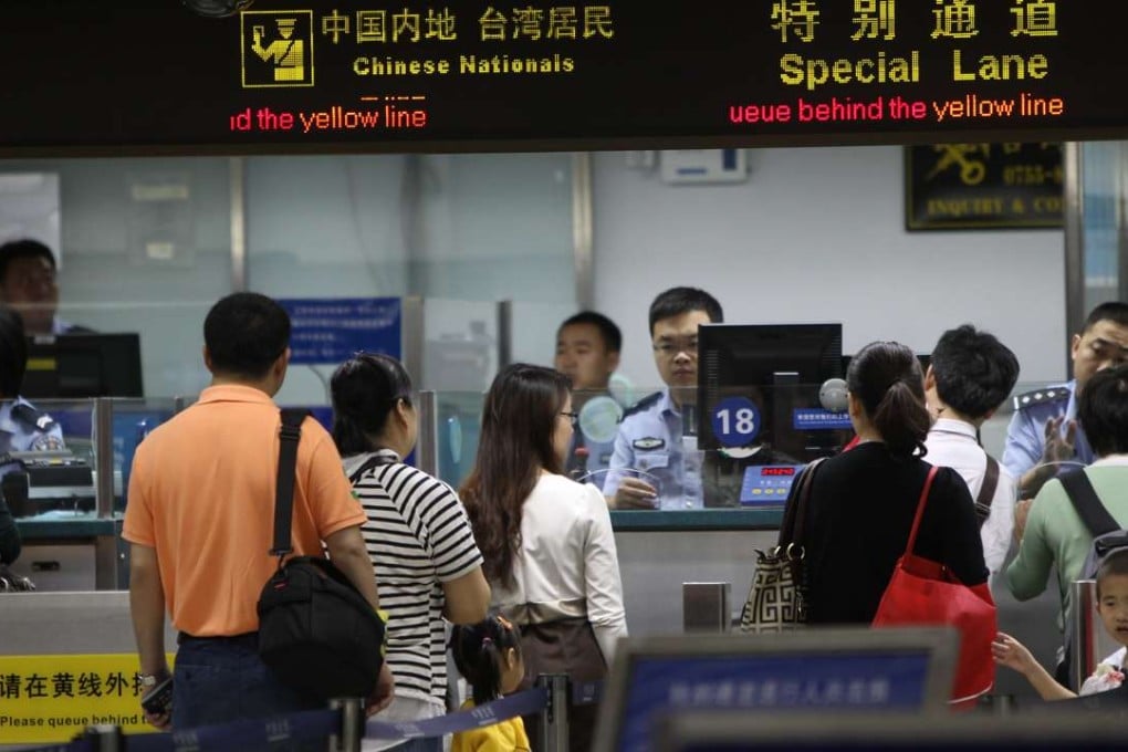 Mainland citizens arriving at immigration counters at the Lo Wu border. Photo: David Wong