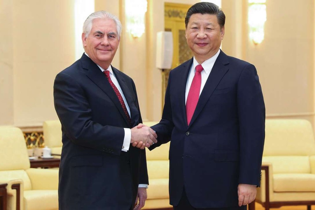 President Xi Jinping shakes hands with US Secretary of State Rex Tillerson at the Great Hall of the People in Beijing on March 19. Photo: AFP