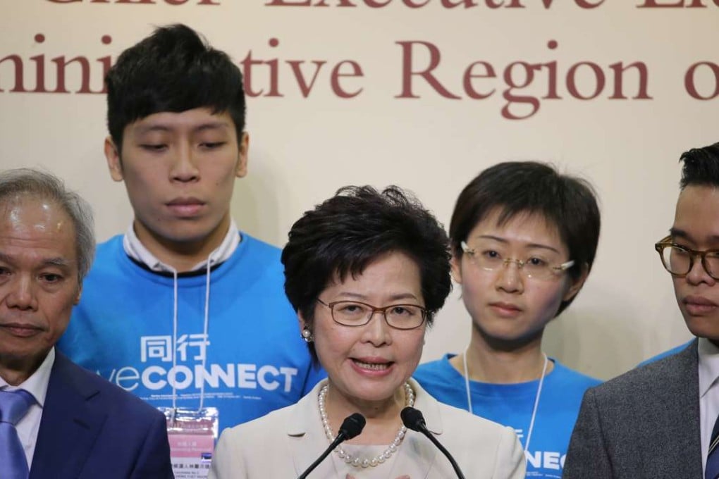 Carrie Lam Cheng Yuet-ngor (centre) meets the media accompanied by her family. Photo: Sam Tsang
