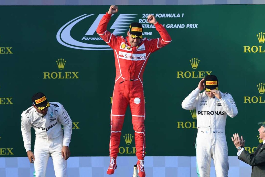 Ferrari’s Sebastian Vettel celebrates winning the opening Grand Prix of the new Formula One season. Photo: AFP