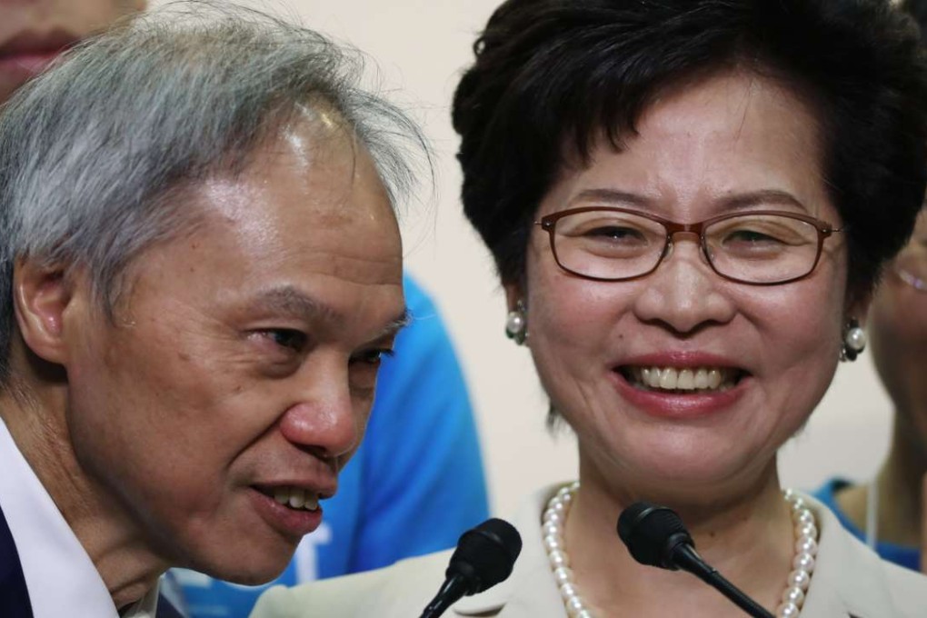 Some people were disappointed that Carrie Lam – pictured here with her husband – had won the election. Photo: Robert Ng
