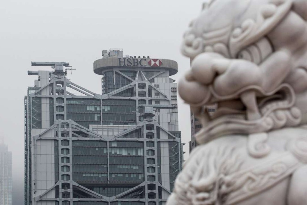 HSBC’s 2016 net profit fell 82 per cent from last year, in what the bank calls a period best remembered for its “largely unexpected economic and political events.” Like other global lenders, HSBC is slashing staff to cut costs. Photo: AFP