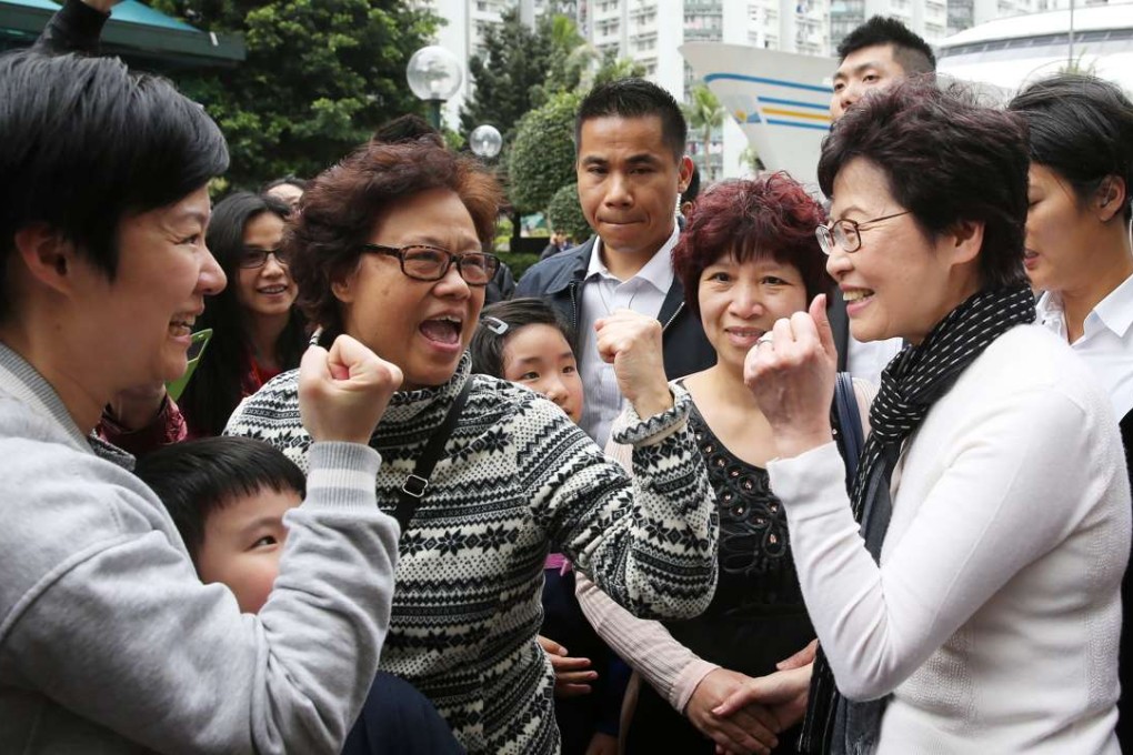 Carrie Lam meets residents in Hung Hom. She will also have to keep an eye on Beijing’s liaison office. Photo: Sam Tsang