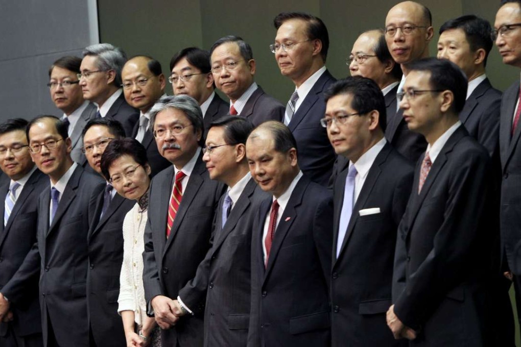Principal officials in Leung Chun-ying’s government line up in June 2012 after their nominations were approved by Beijing. Photo: David Wong