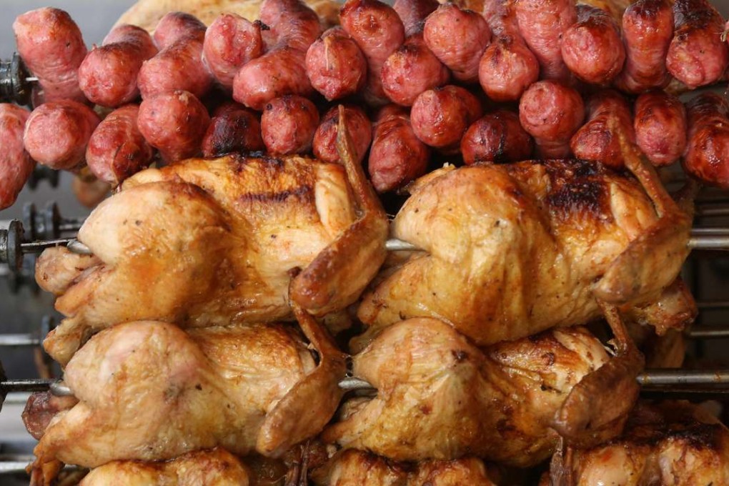 View of chickens and sausages in a steakhouse in Rio de Janeiro, Brazil. The meat industry in Brazil, one of the biggest in the country, is facing a crisis after the operation 'Carne Fraca' (weak meat), affecting not only the exportations of the product but also the local market. Photo: EPA